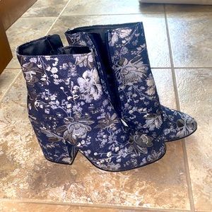 Metallic silver and navy boots in size 6. The perfect statement shoe!
